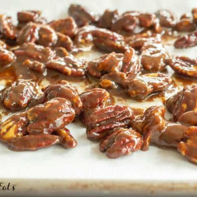 close up of candied pecans on tabletop