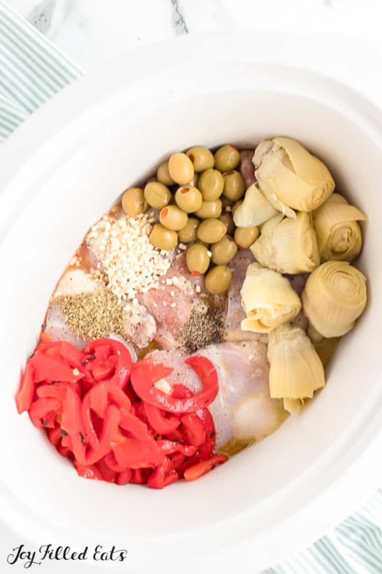 ingredients for Mediterranean Chicken in a Crock Pot before cooking