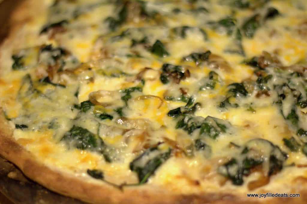close up on keto white spinach pizza
