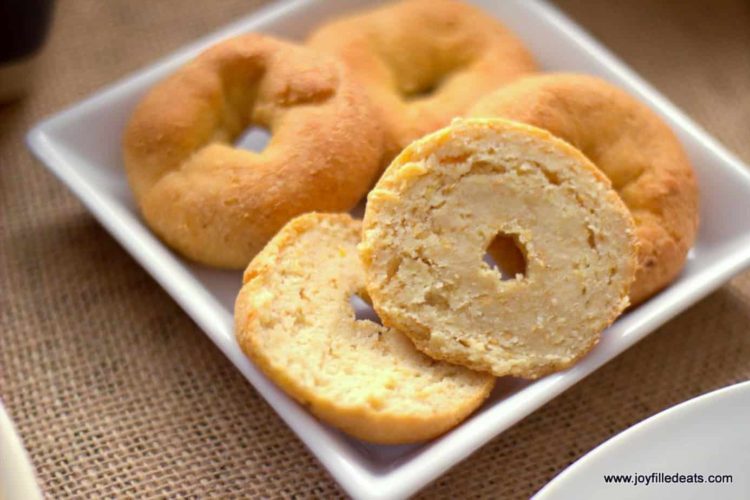 plate of low carb mini bagels with one sliced in half