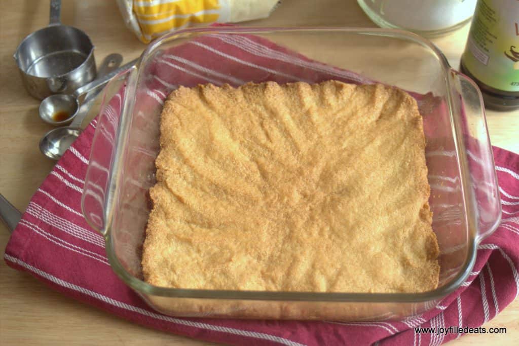 cookie bar crust baked into a square baking dish