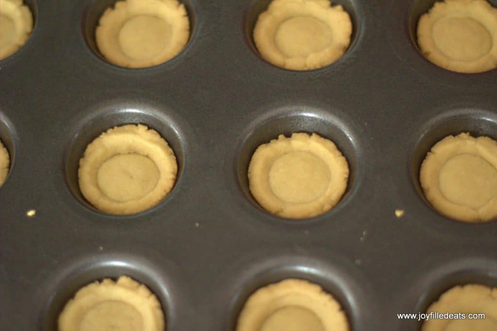 mini tart cups baked in a mini muffin tin up close