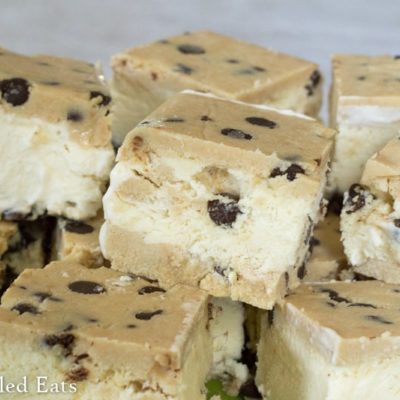 pile of chocolate chip cookie dough ice cream sandwiches close up