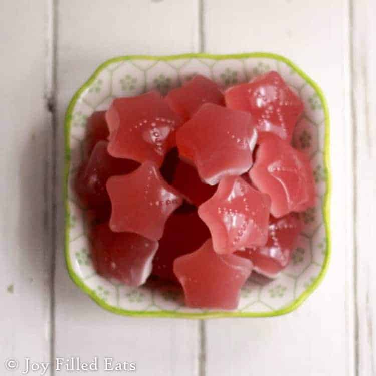overhead view of three ingredient gummies shaped as stars in a small dish