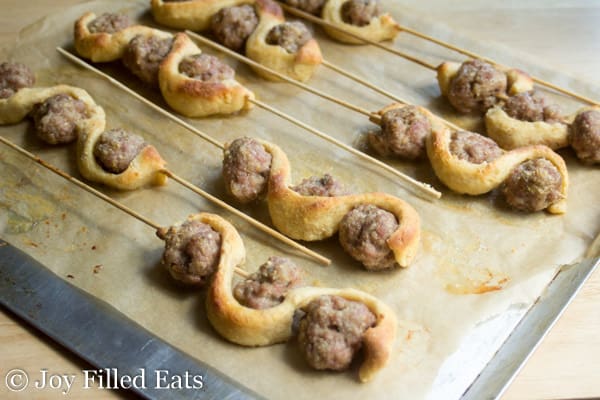 Low Carb Meatball Sub Kabobs arranged on a sheet pan