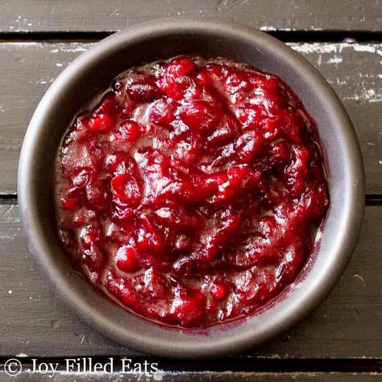 overhead view of a bowl filled with four ingredient cranberry sauce