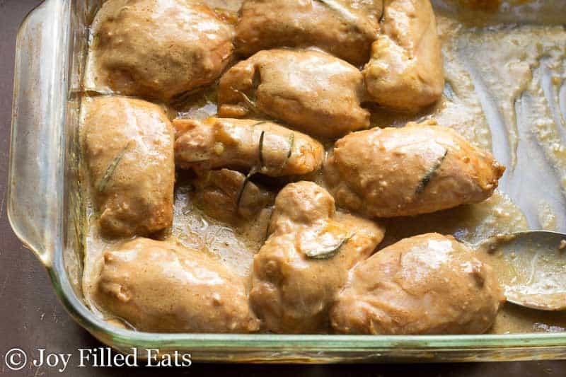 baking dish filled with sweet maple mustard chicken