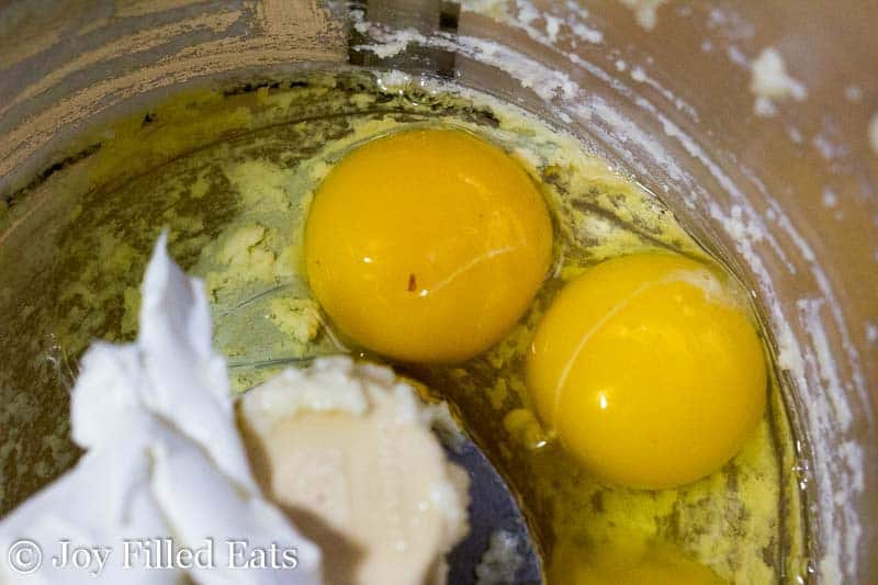 close up on ingredients for mini quiches in a food processor