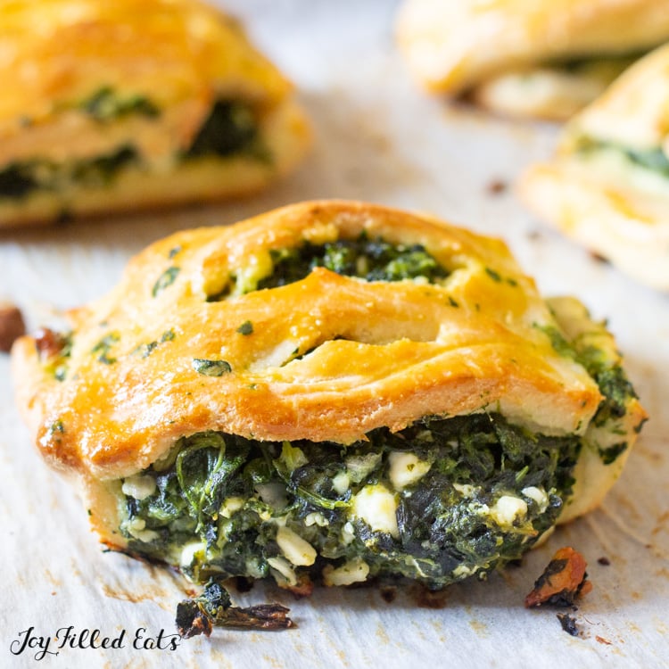 close up on keto spanakopita lined on parchment paper