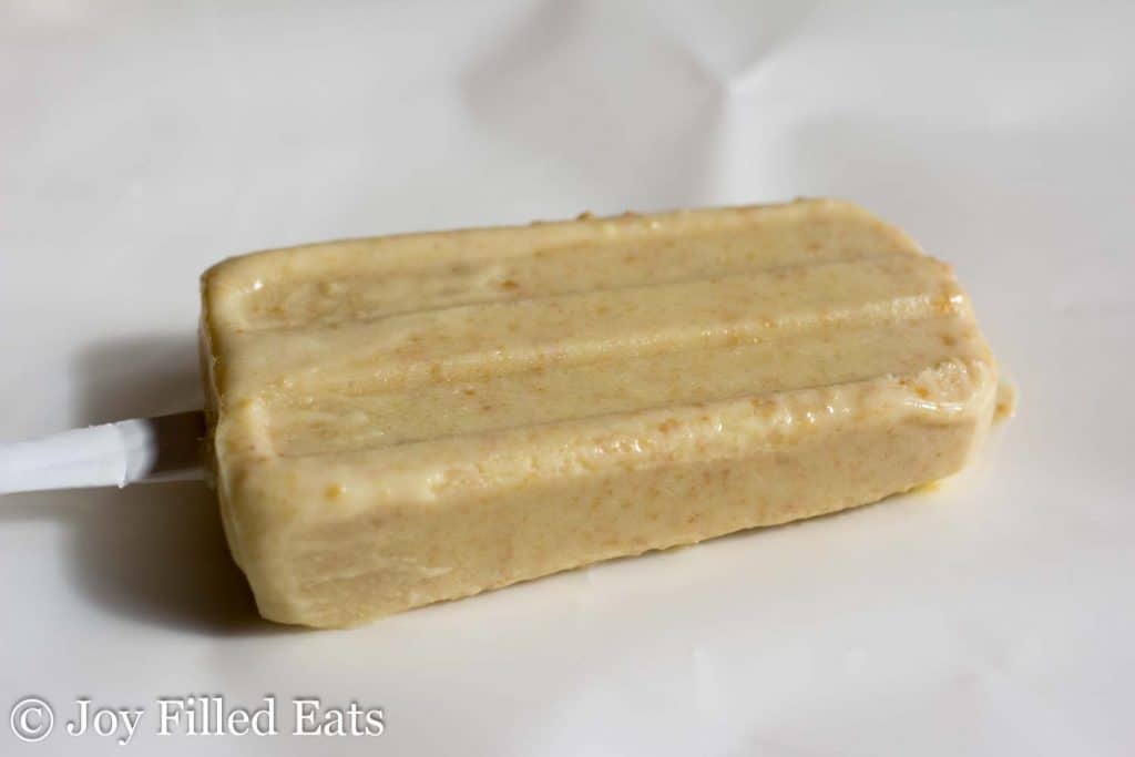 peanut butter ice cream bar laying on a white table