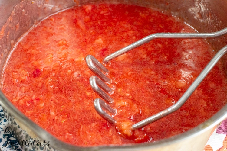 Pot of strawberry jam cooking