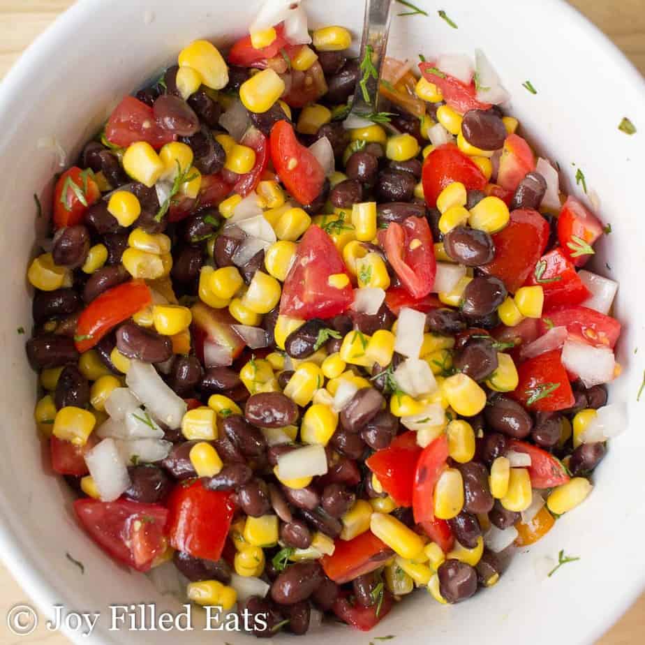 black bean and corn salsa in a mixing bowl from above