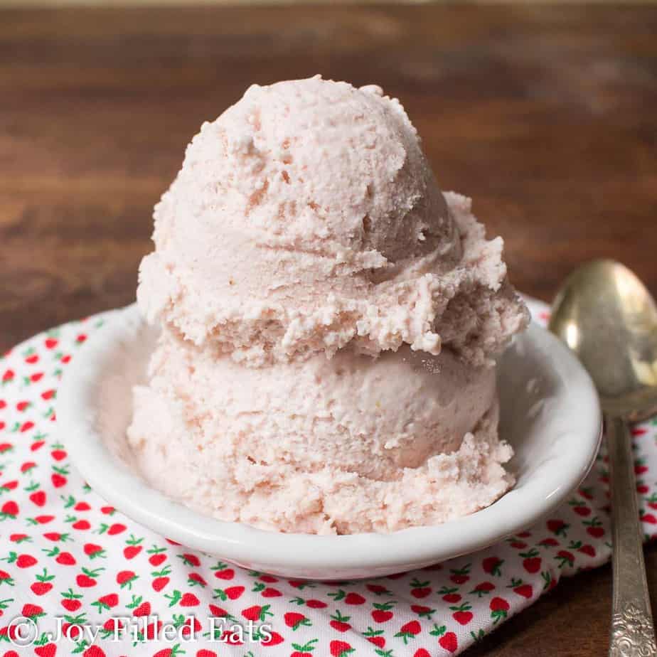 two scoops of keto strawberry ricotta ice cream stacked in a bowl