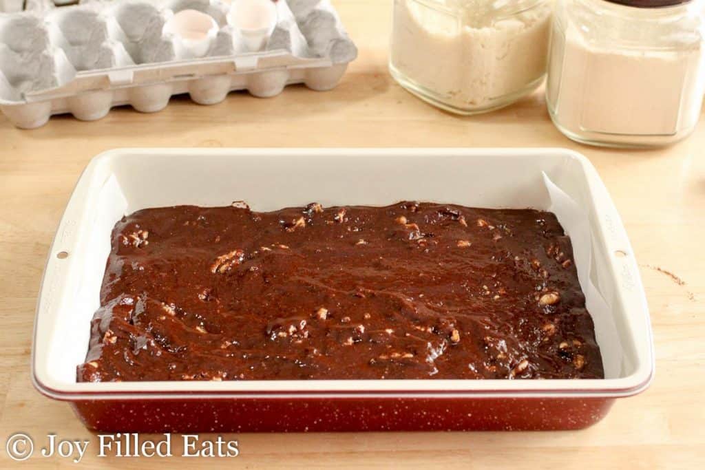 brownie batter lined in a casserole dish