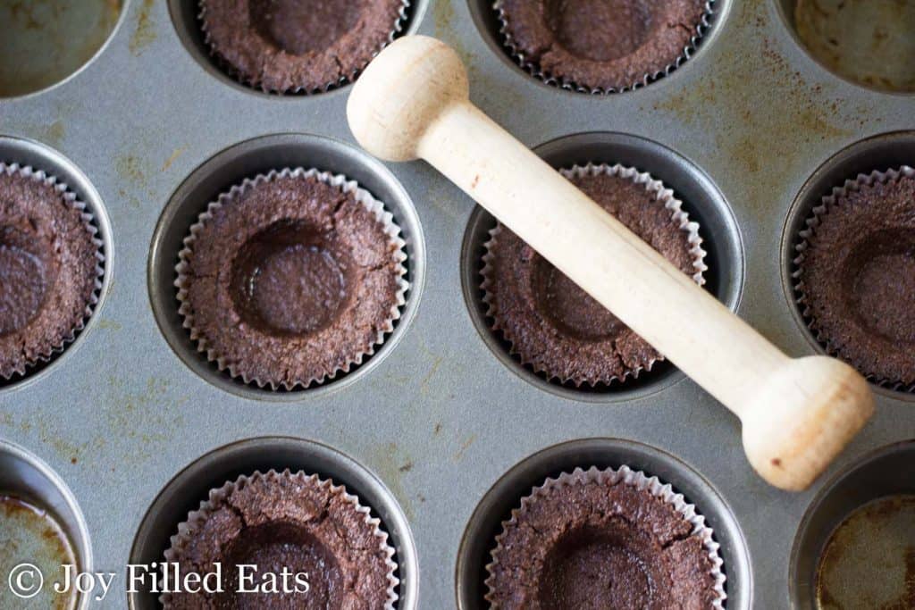 dowel used to shape cookie cup in mini muffin tin