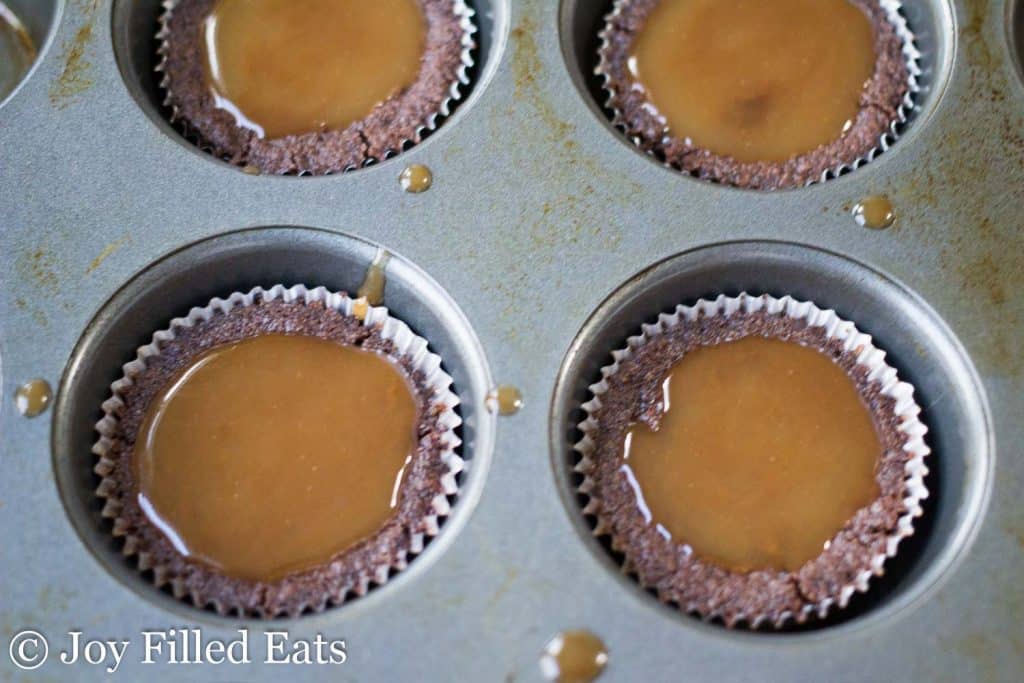 mini muffin tin filled with English Toffee Cappuccino cookies before baking