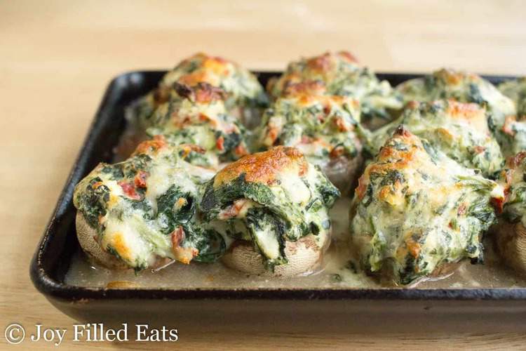 baking sheet lined with Tuscan stuffed mushrooms