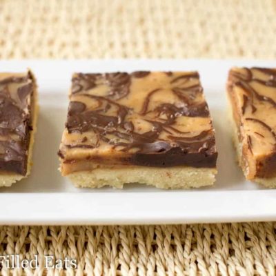 salted caramel shortbread squares lined on a platter