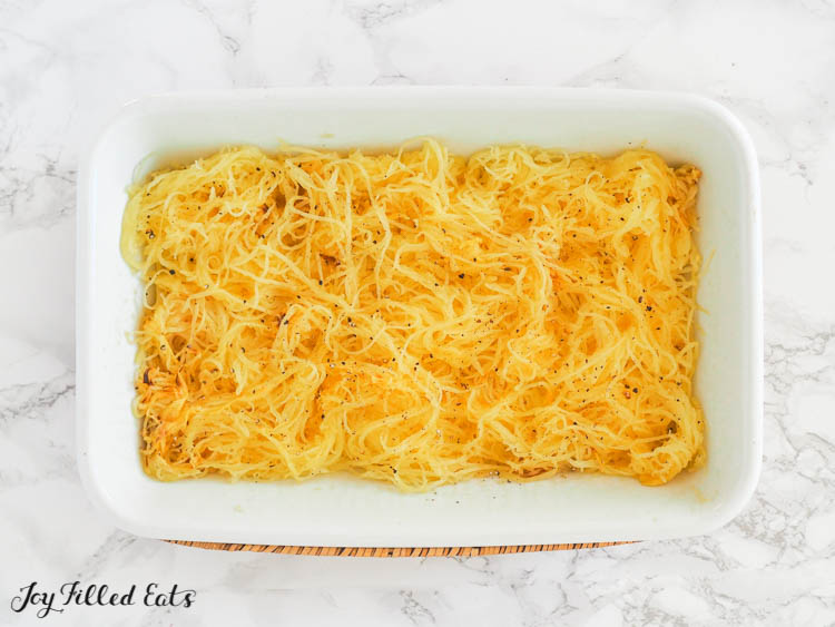 casserole dish lined with cooked spaghetti squash
