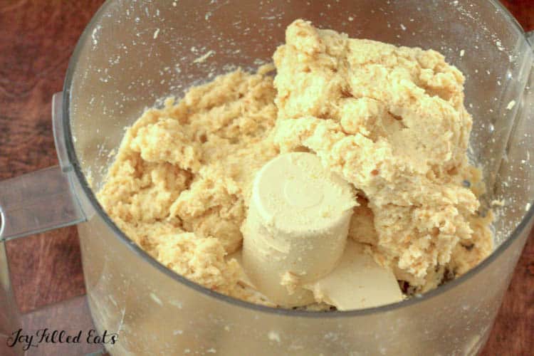 close up of food processor with keto breadstick dough
