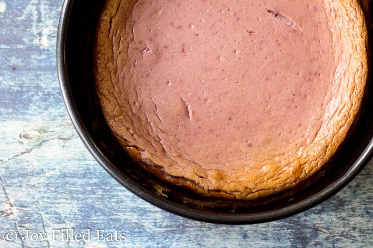 raspberry cheesecake from above in cake tin