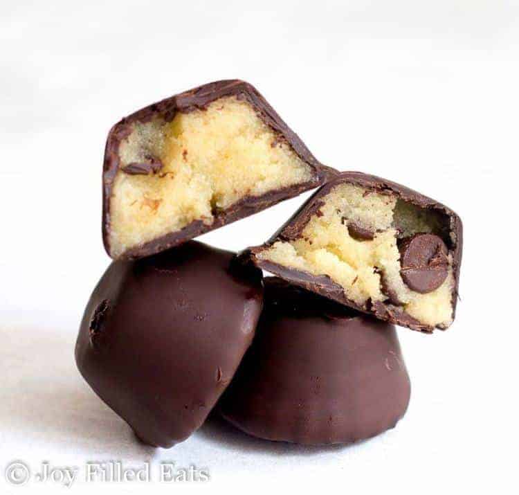 A stack of Frozen Keto Cookie Dough Bites on a white background