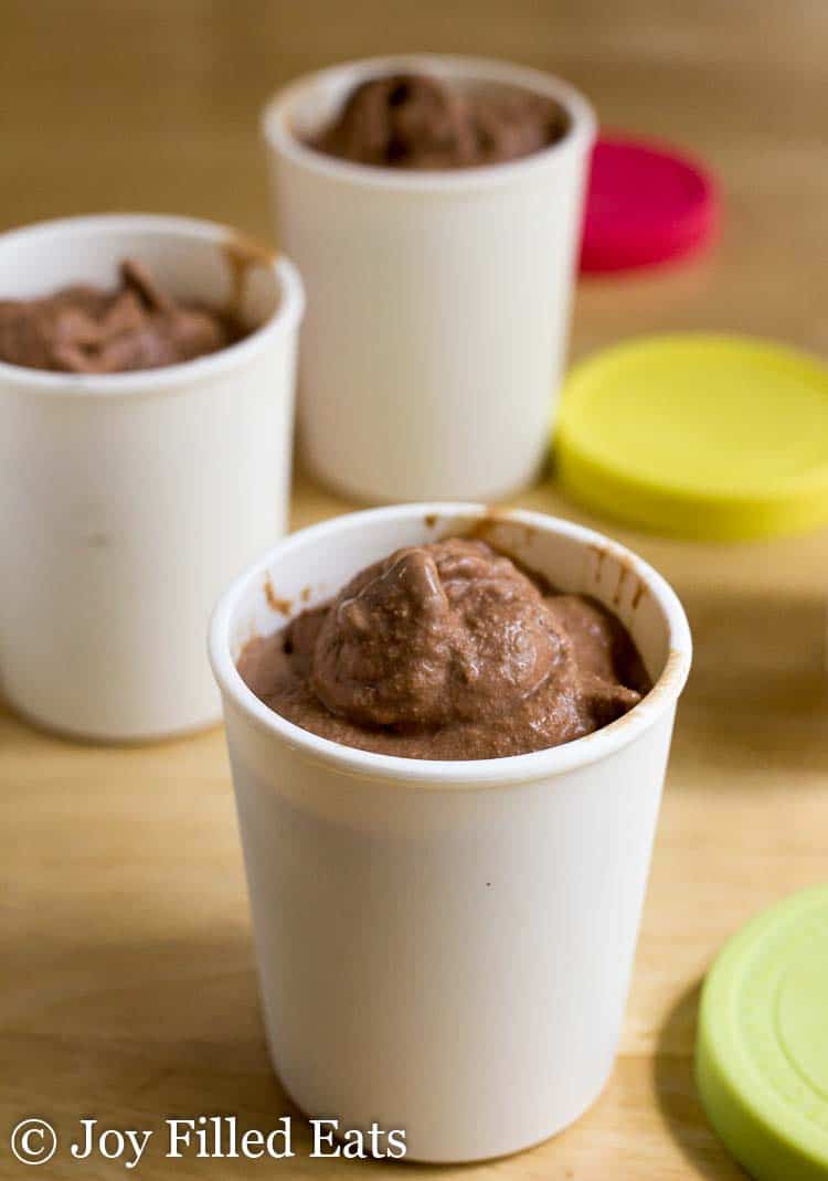 three containers full of dairy free chocolate ice cream