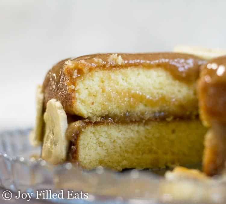 close up on banana foster cake exposing two cake layers