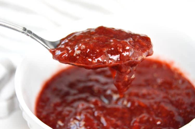 A spoon of Strawberry Jam for Low Carb Strawberry Almond Flour Muffins