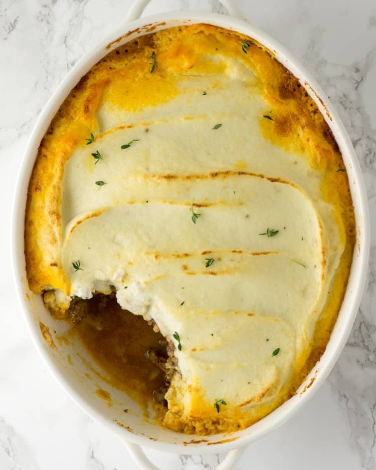 overhead view of the baked casserole with large spoonful removed