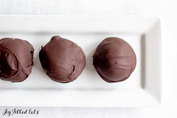 Healthy 5-Ingredient Dark Chocolate Peanut Butter Balls - The BakerMama