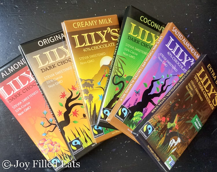 variety of Lily's chocolate bars fanned out on surface