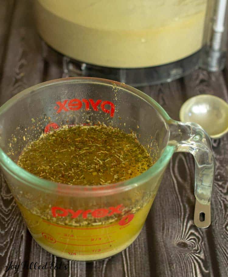 Measuring cup of Chicken Bouillon liquid