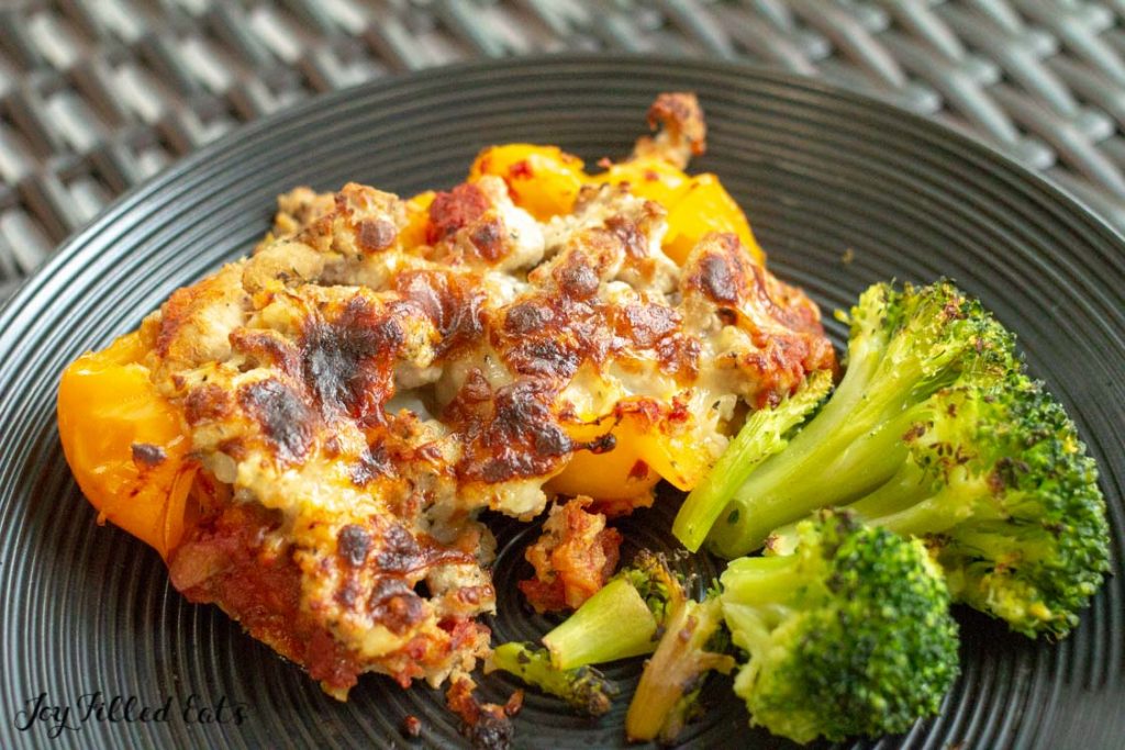 stuffed pepper casserole serving on a plate with broccoli