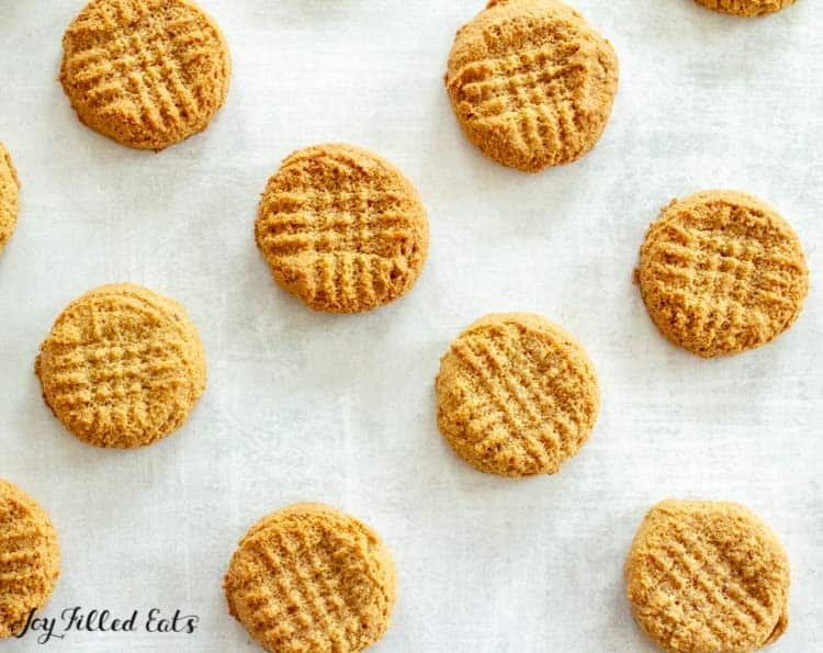 baked dairy-free peanut butter cookies arranged on surface