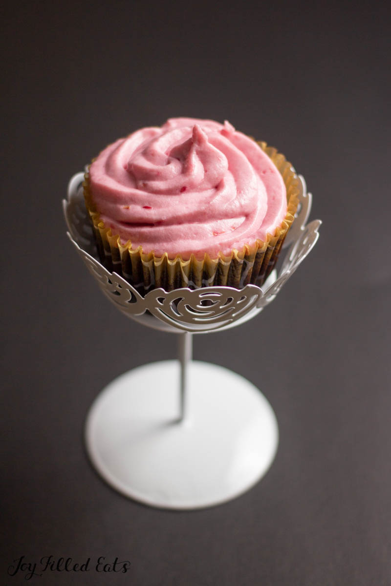 chocolate champagne cupcake on stand