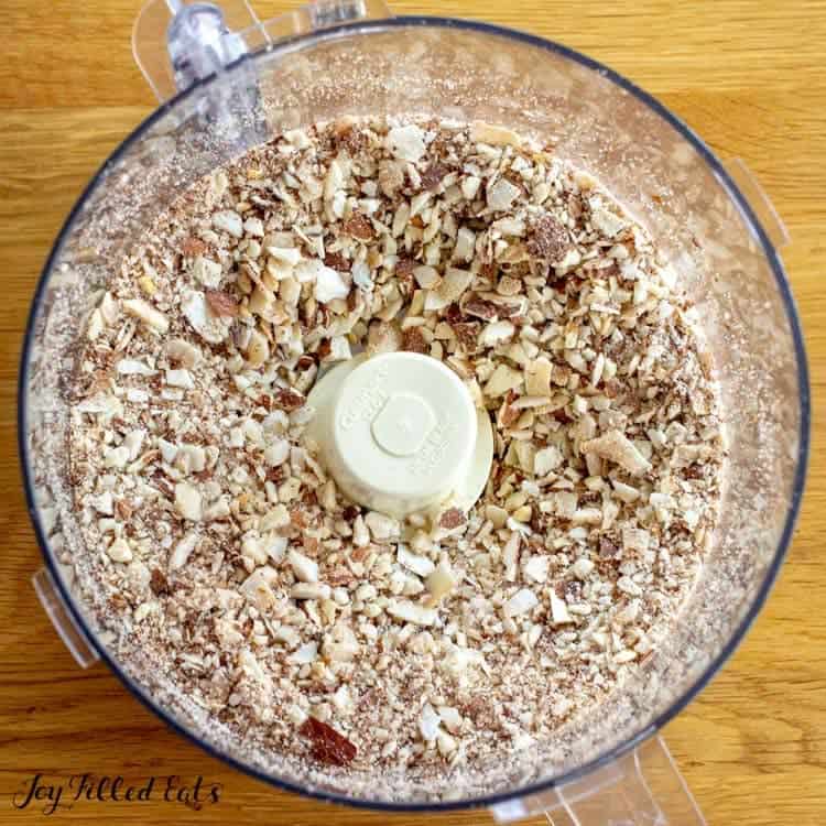 food processor filled with granola mixture