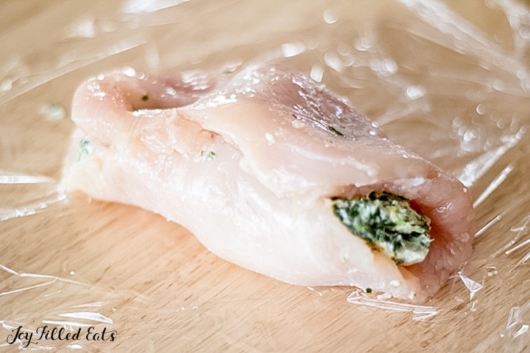 one of the keto stuffed chicken breasts filled with spinach artichoke stuffing