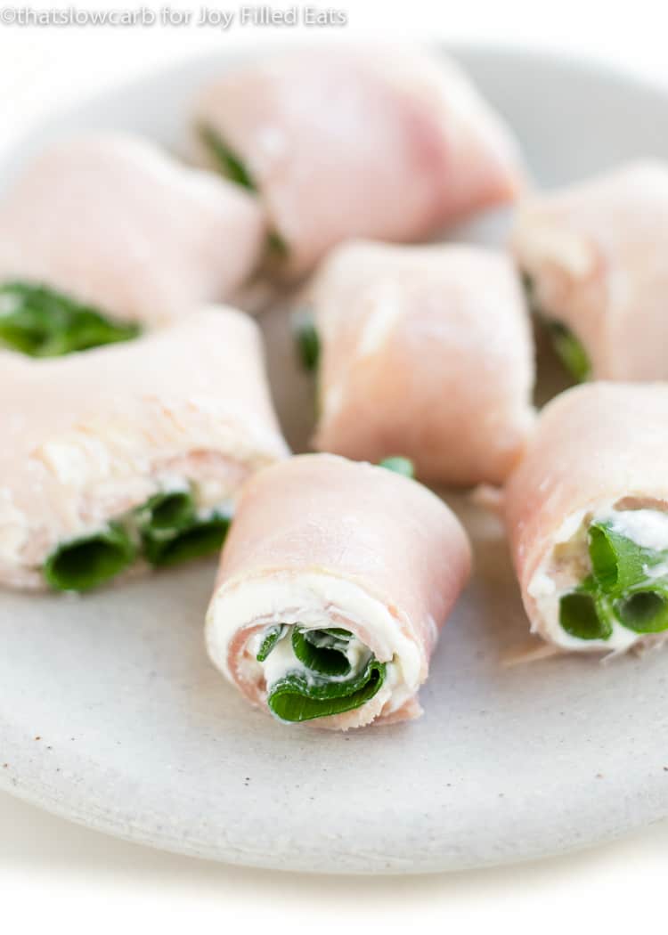close up on ham and cream cheese roll ups