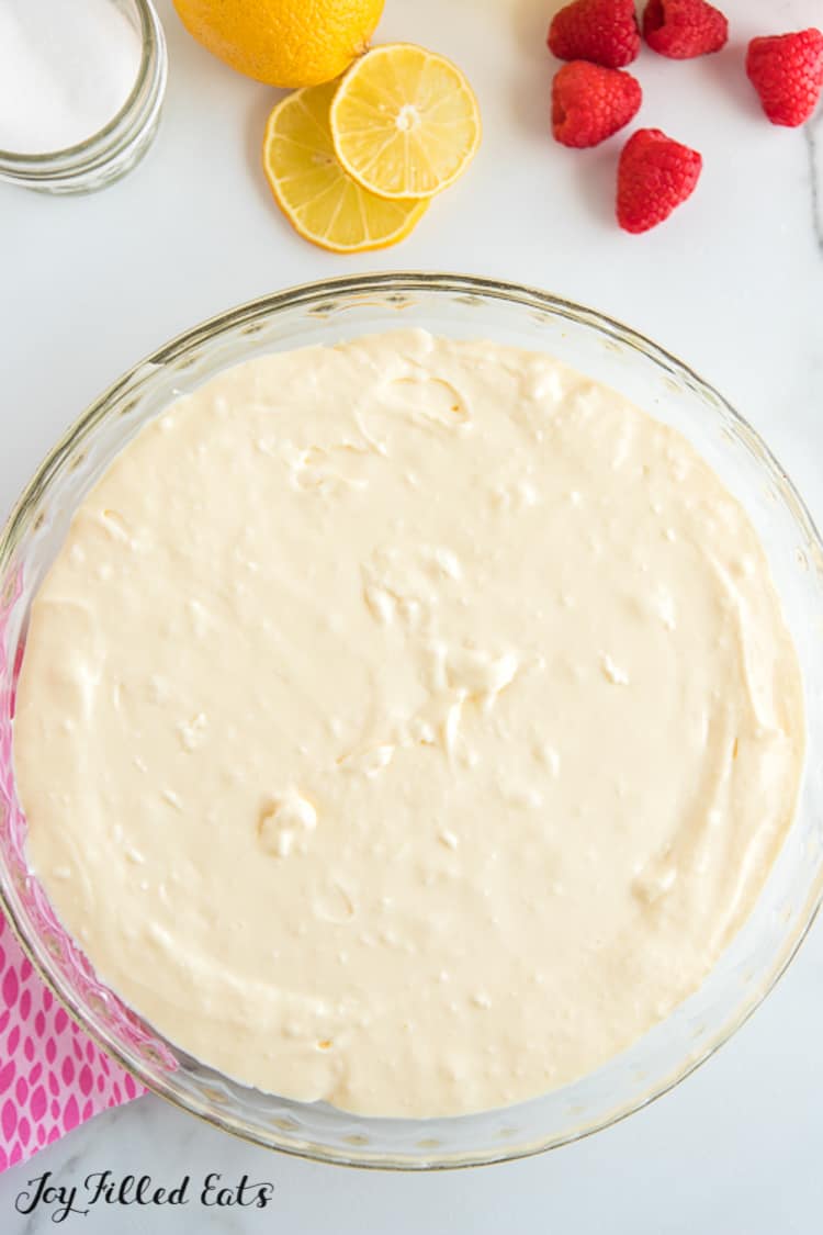 lemon chesecake batter in pie plate before mixing