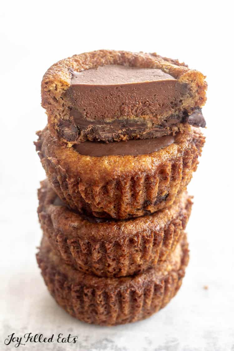 close up of chocolate chip cookie cup stack with top cup sliced in half
