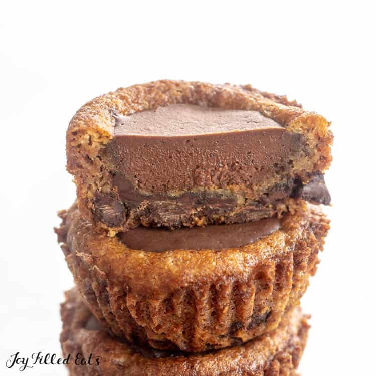 close up of ganache filling in sliced chocolate chip cookie cup