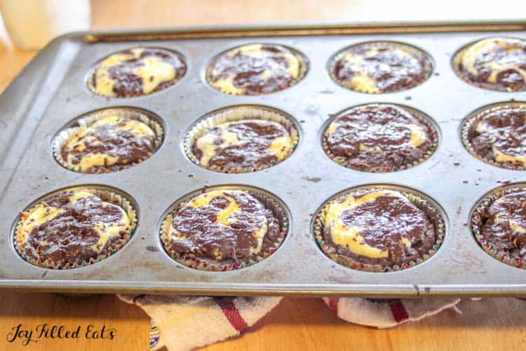 Muffin Tin filled with Black Bottom Cupcakes