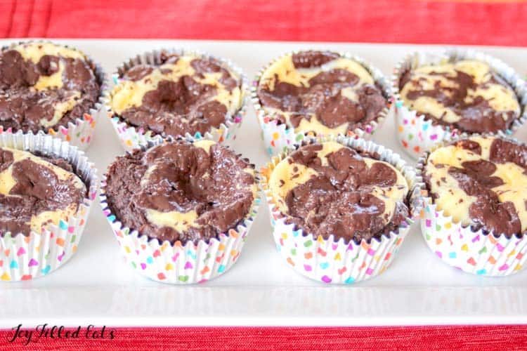 Black Bottom Cupcakes arranged in two rows on a platter