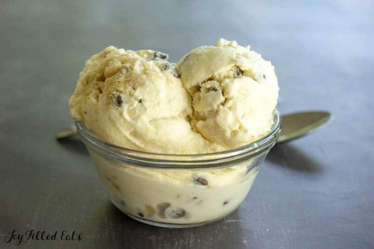 scoops of cookie dough ice cream in a small glass bowl