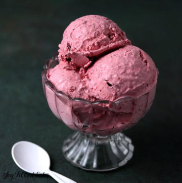Small Glass Ice Cream bowl of berry keto ice cream with white spoon