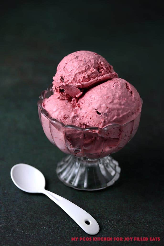 Beautiful Ice Cream With Fruits And Berries In A Glass Container