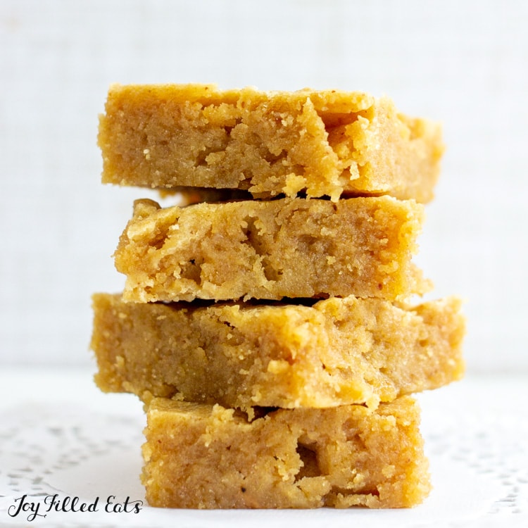 close up on stack of white chocolate keto peanut butter blondies