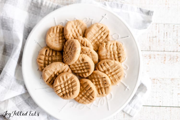 keto no bake peanut butter cookies arranged on round white plate