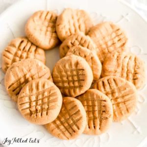 Pile of no bake peanut butter cookies on a round, white plate